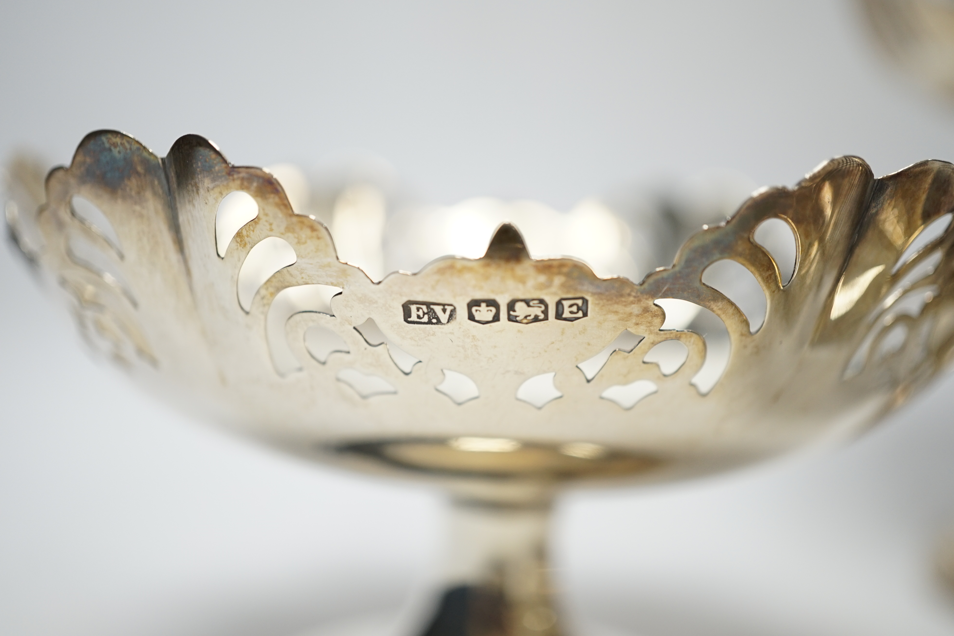 A pair of George VI pierced silver pedestal bon bon dishes, Viners Ltd, Sheffield, 1947, 11.7cm and three other assorted silver bonbon dishes, one with ring handles.